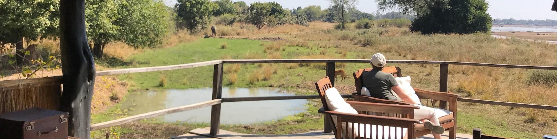 Person sitting in safari lodge