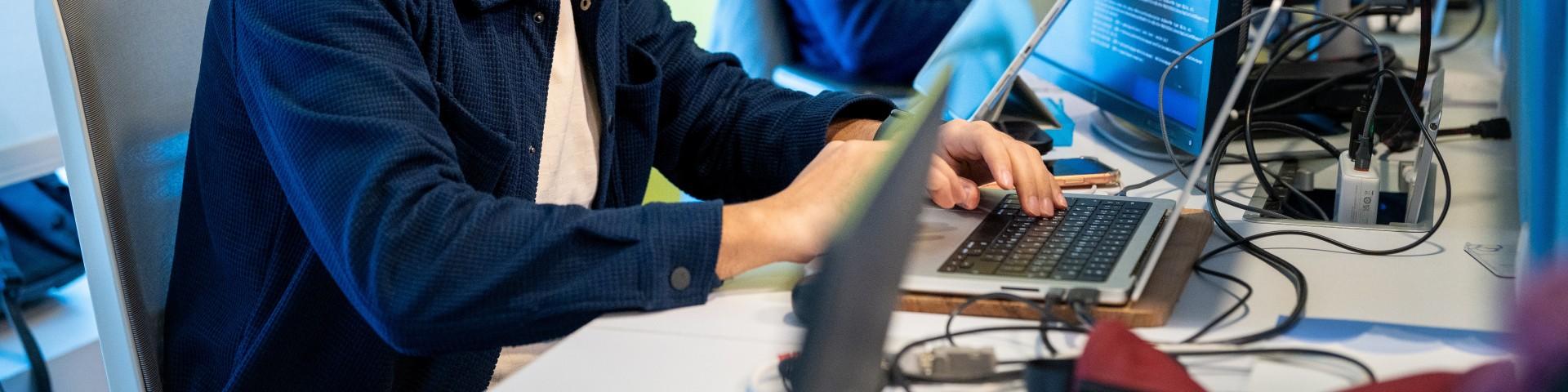 person working on their laptop