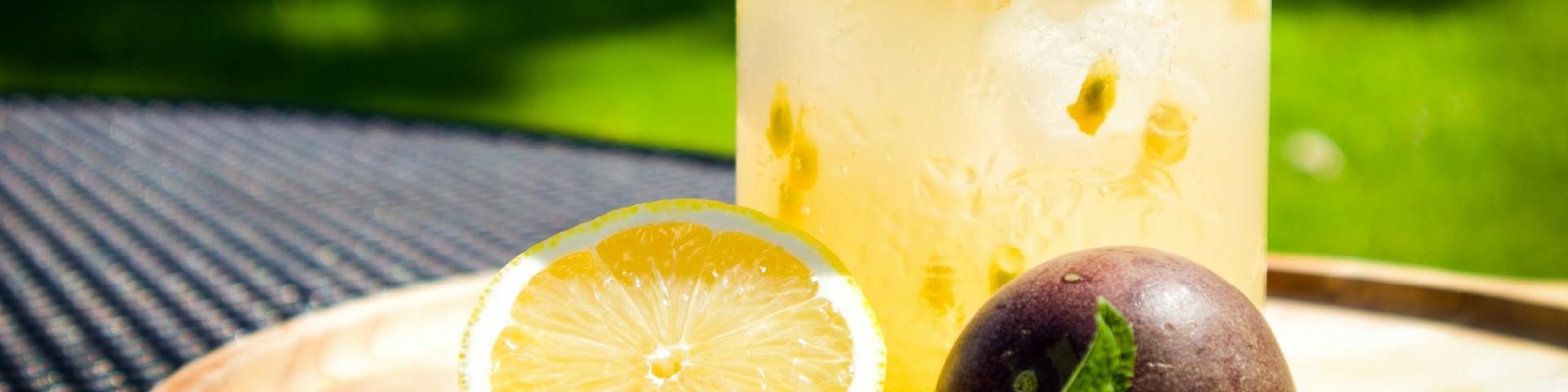 Glass filled with passionfruit drink