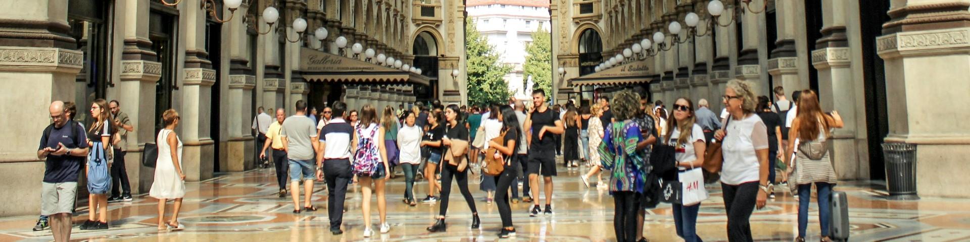 People walking in a busy shopping arcade