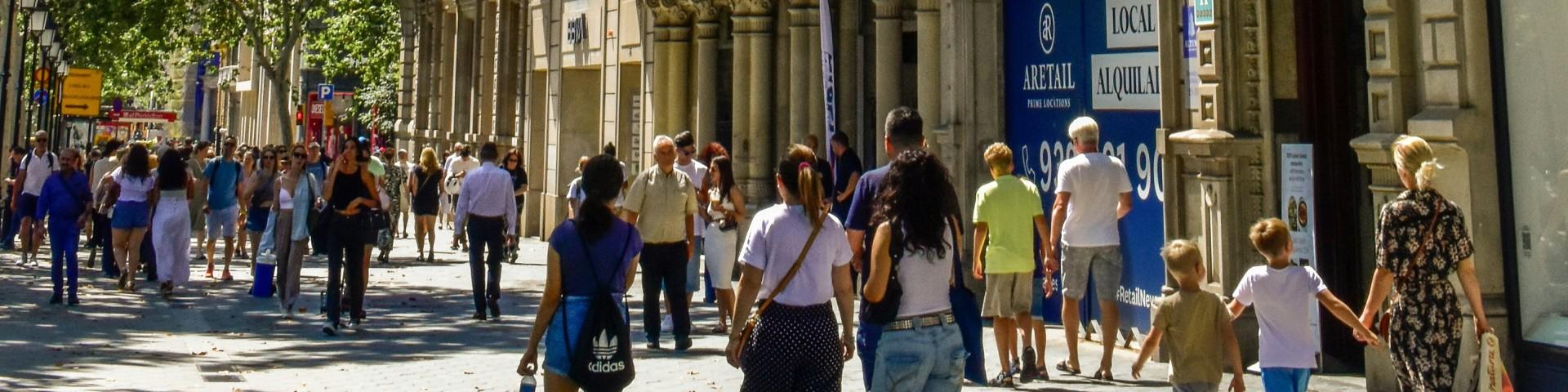 People walking in a busy shopping street