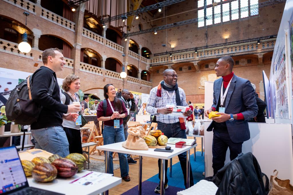 Group of people laughing at Cocoa Fair