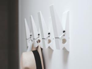 Wall hooks shaped (and functioning) like clothes pegs