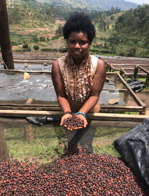 Woman with coffee beans