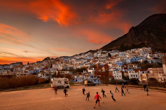 Joining locals in a game of street football