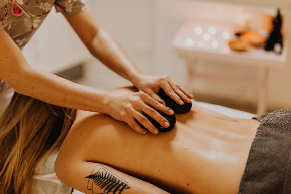 A massage in a peaceful environment is included in many wellness packages