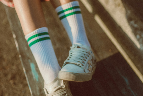 Figure 3: The long white sports sock is a popular style choice among younger Europeans