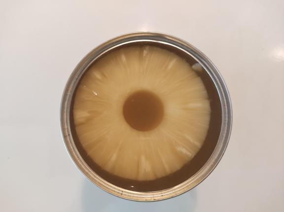 Figure 2: Pineapple slices inside a can 