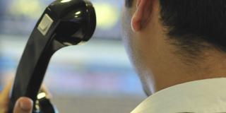 Call centre employee answering the phone