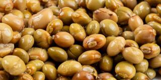 Close-up of fresh pigeon peas against a white background