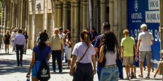 People walking in a busy shopping street