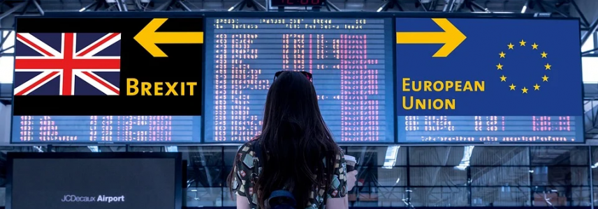 Women at airport looking at sign- Brexit and European Union